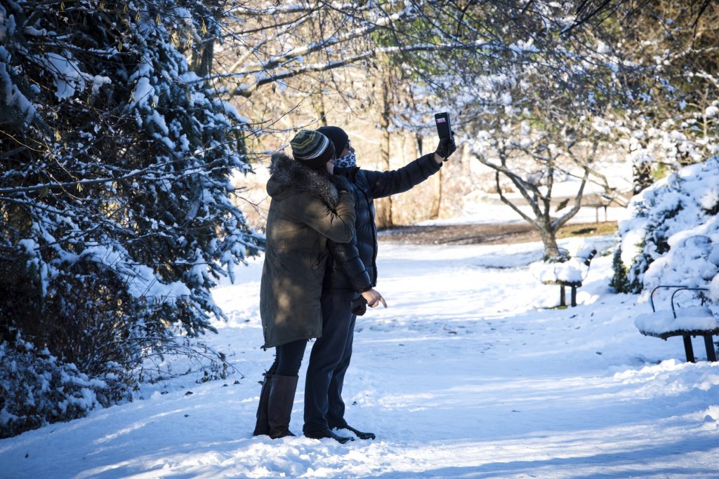 Two people taking a selfie on a winter day